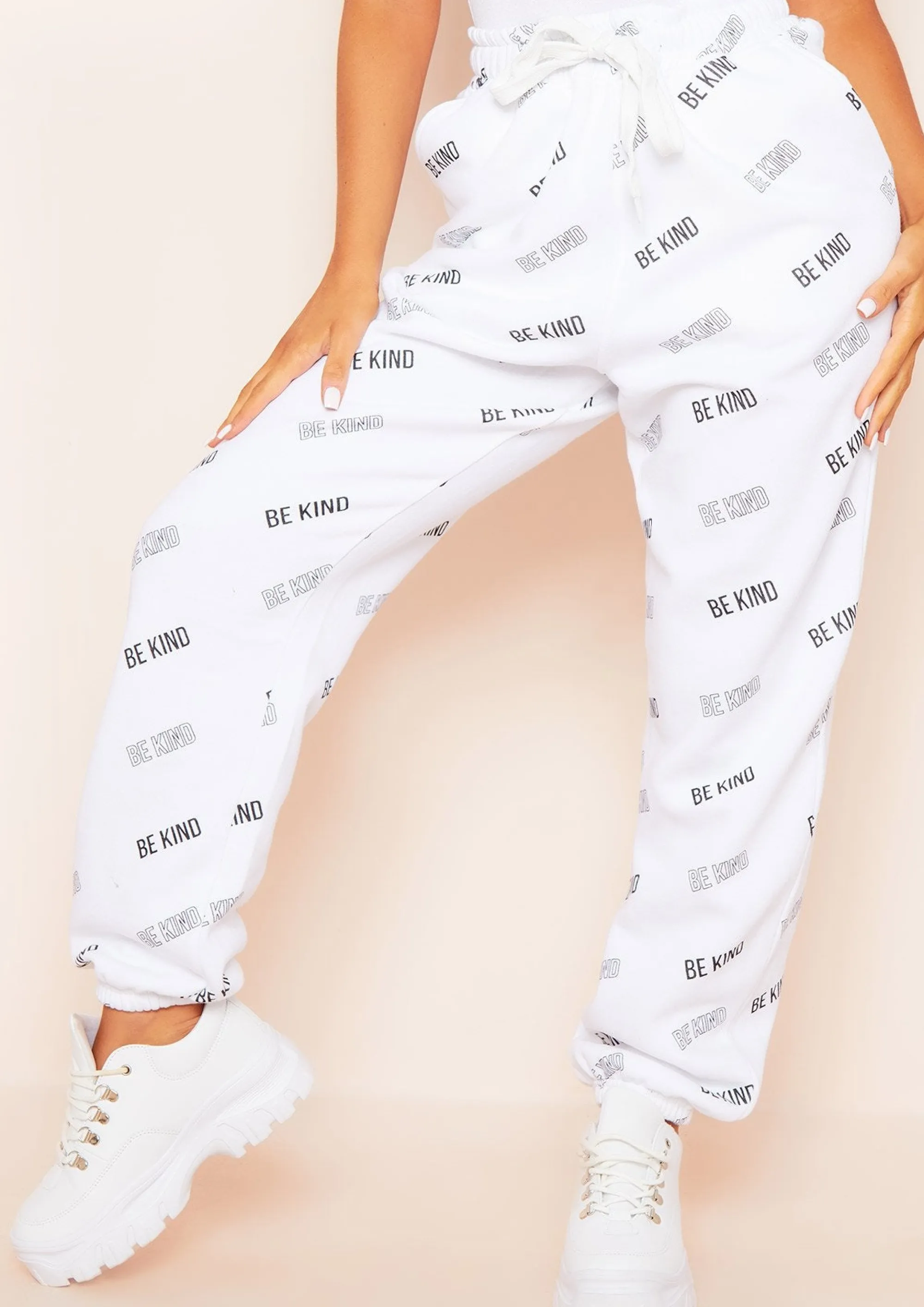 Missy Empire Candice White Be Kind Repetitive Text Oversized Joggers Sale